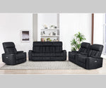 Black reclining sofa set in a living room setting with decor elements.