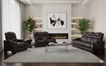 Modern living room with brown leather furniture, a fireplace, and decorative elements.
