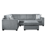 Gray sectional sofa with ottoman on a white background
